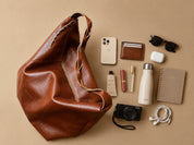 Bolso Trenza con objetos de uso diario (imagen ilustrativa)