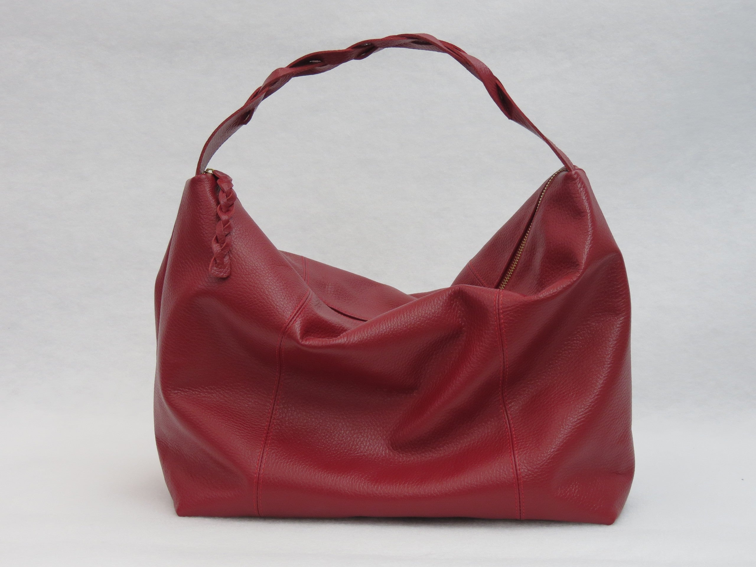 Bolso Trenza en cuero vino tinto, vista en tres cuartos